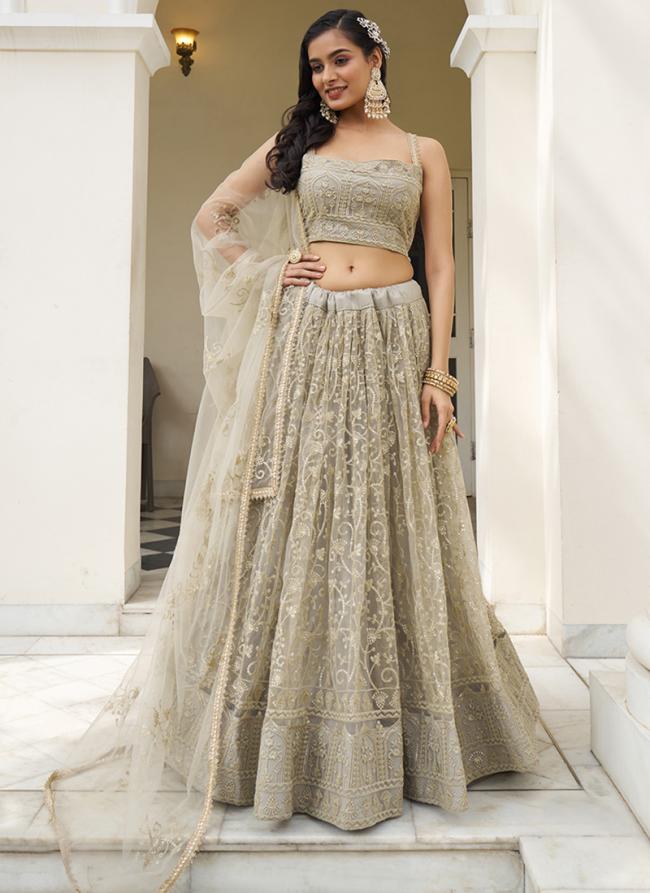 Butterfly Net Ivory Wedding Wear Embroidery Work Lehenga Choli